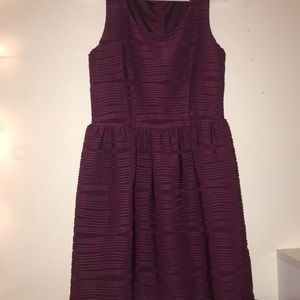 A maroon  dress